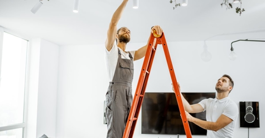 man upgrading lights